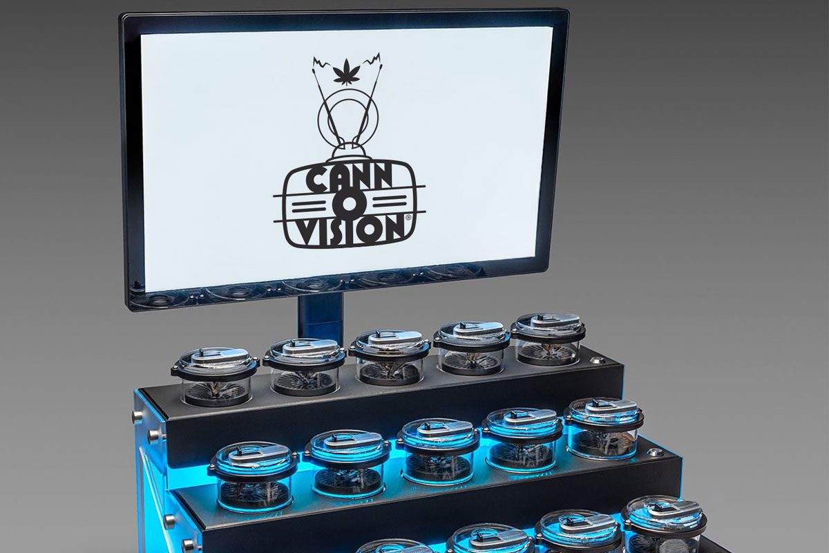 Cann-O-Vision™ interactive cannabis display system from Bud Bar Displays featuring lift-and-learn technology, touchscreen product information, and illuminated Canna-Pod® showcases